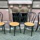 Two pairs of black 50s chairs - number 18 - cannée