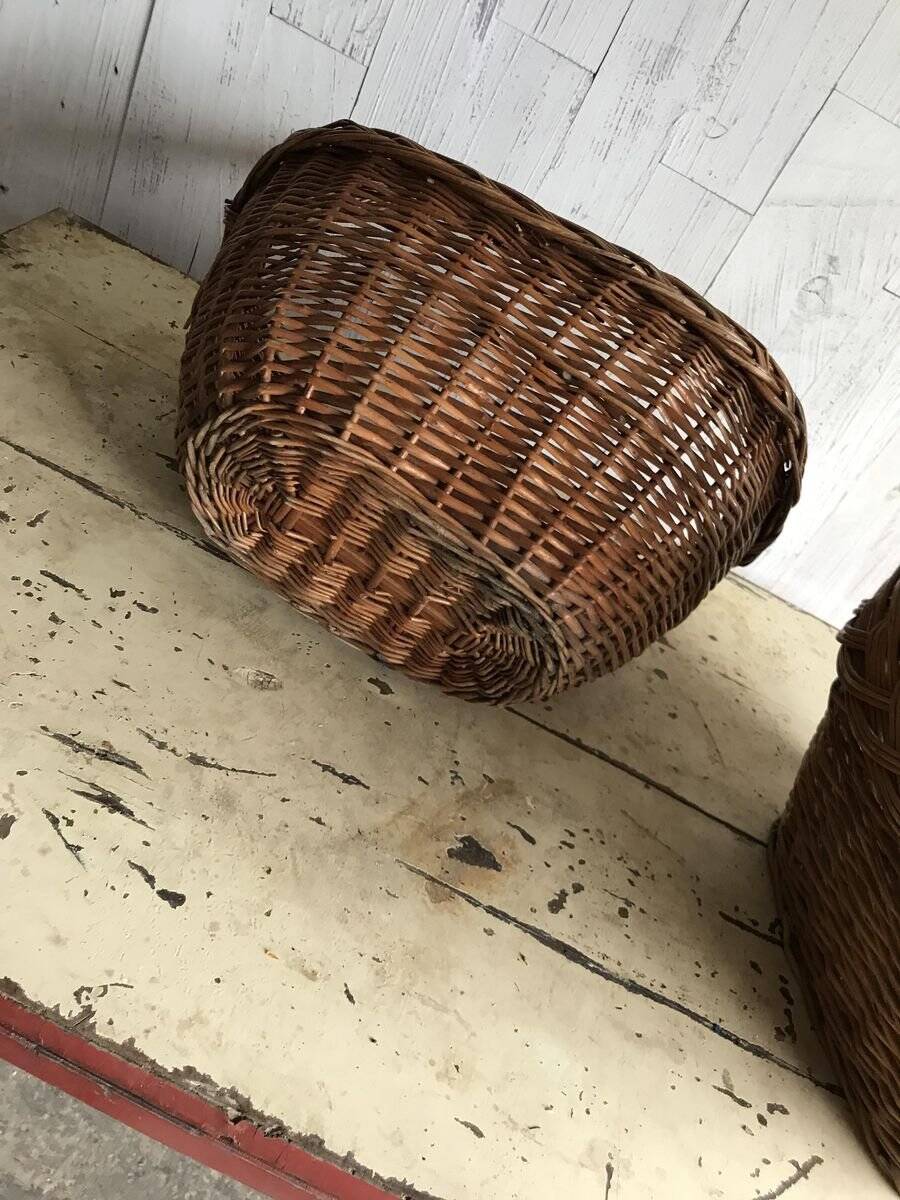 Set of 2 brown wicker baskets from the 1960s — decorative weaving and double handles.