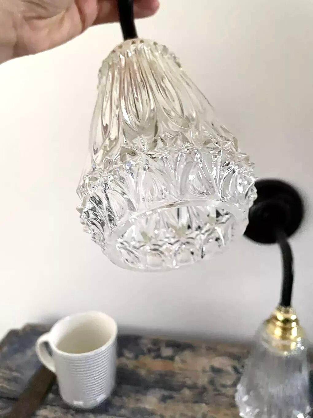 Set of two electrified chiseled glass sconces to nine