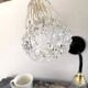 Set of two electrified chiseled glass sconces to nine