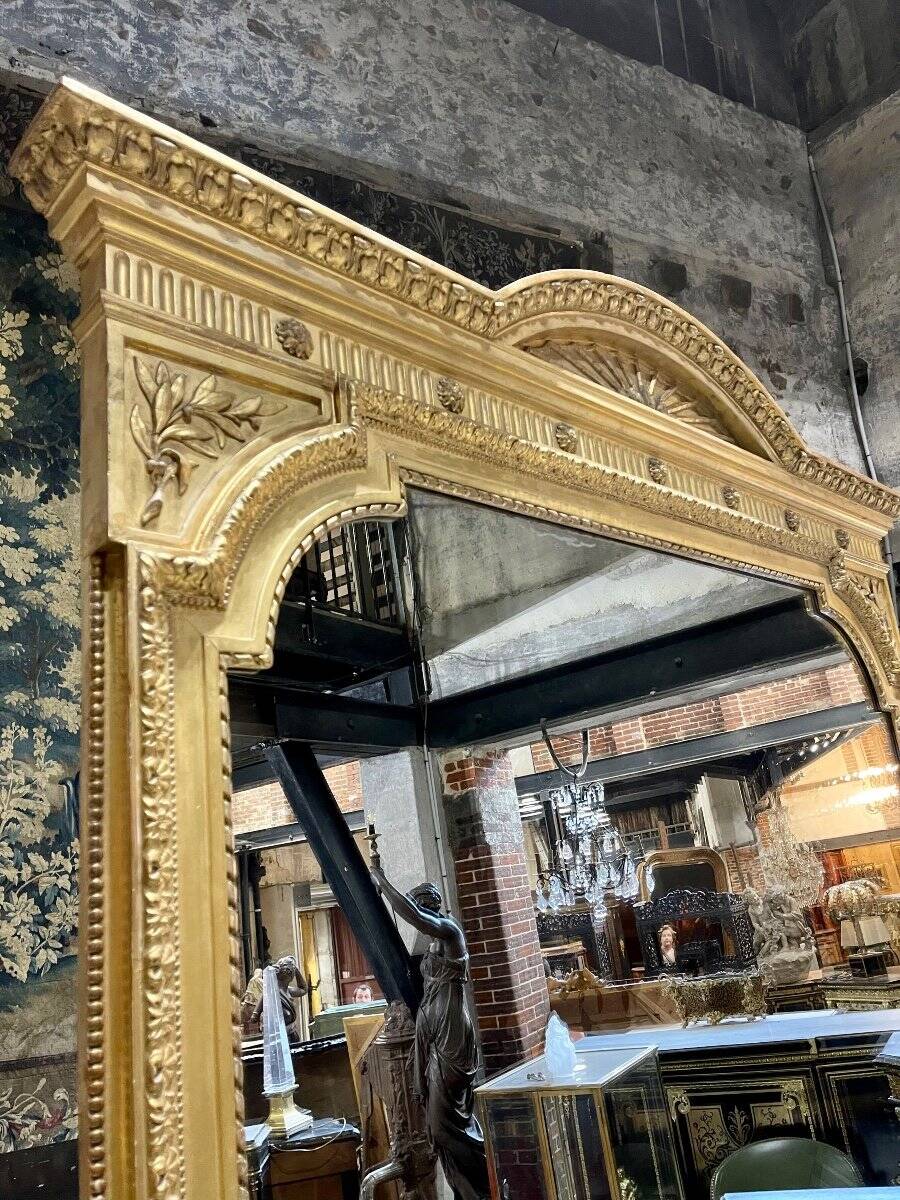 Louis XVI style gilded wood mirror from the Napoleonic III era, 2.75m x 1.48m.
