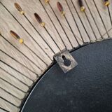 Vintage metal sun mirror in the style of Line Vautrin