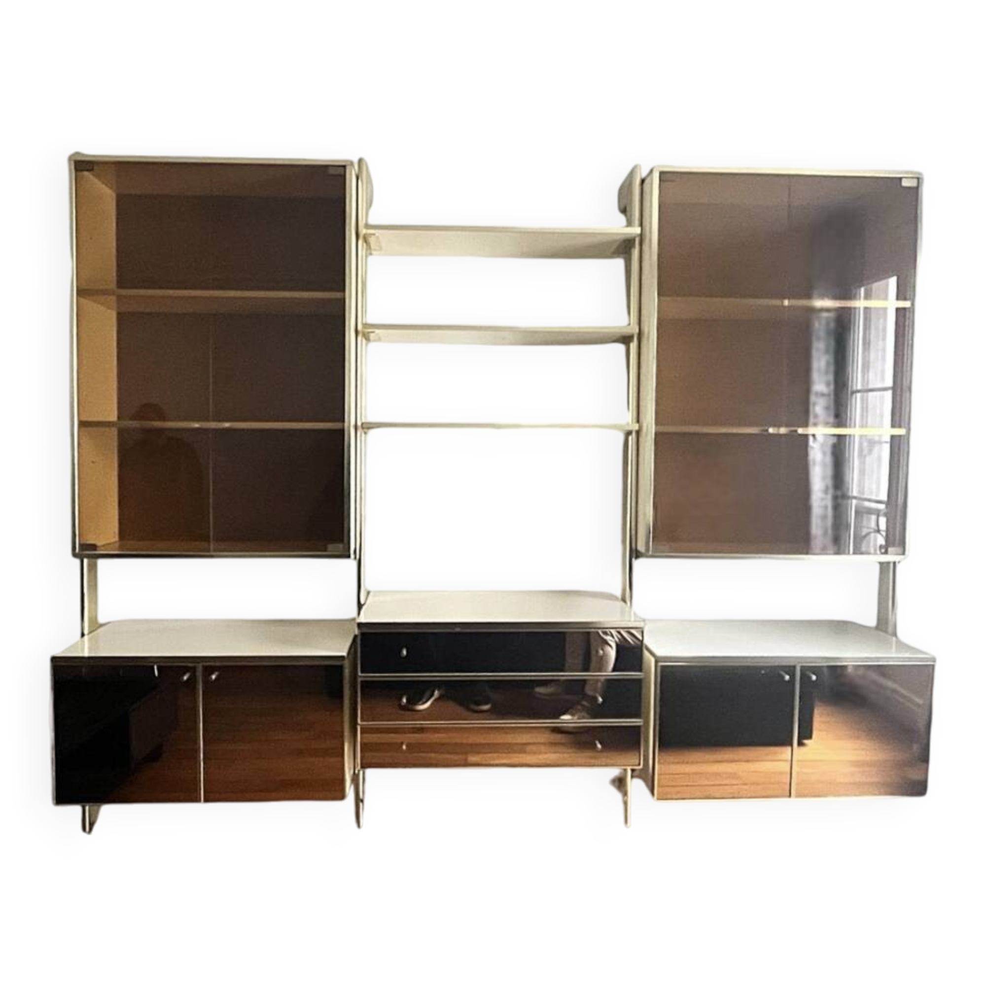 Wall-mounted and modular bookcase in lacquered brass, mirrors and smoked glass by Mahey, Design 1970