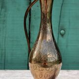 Carafe vase in chiseled brass