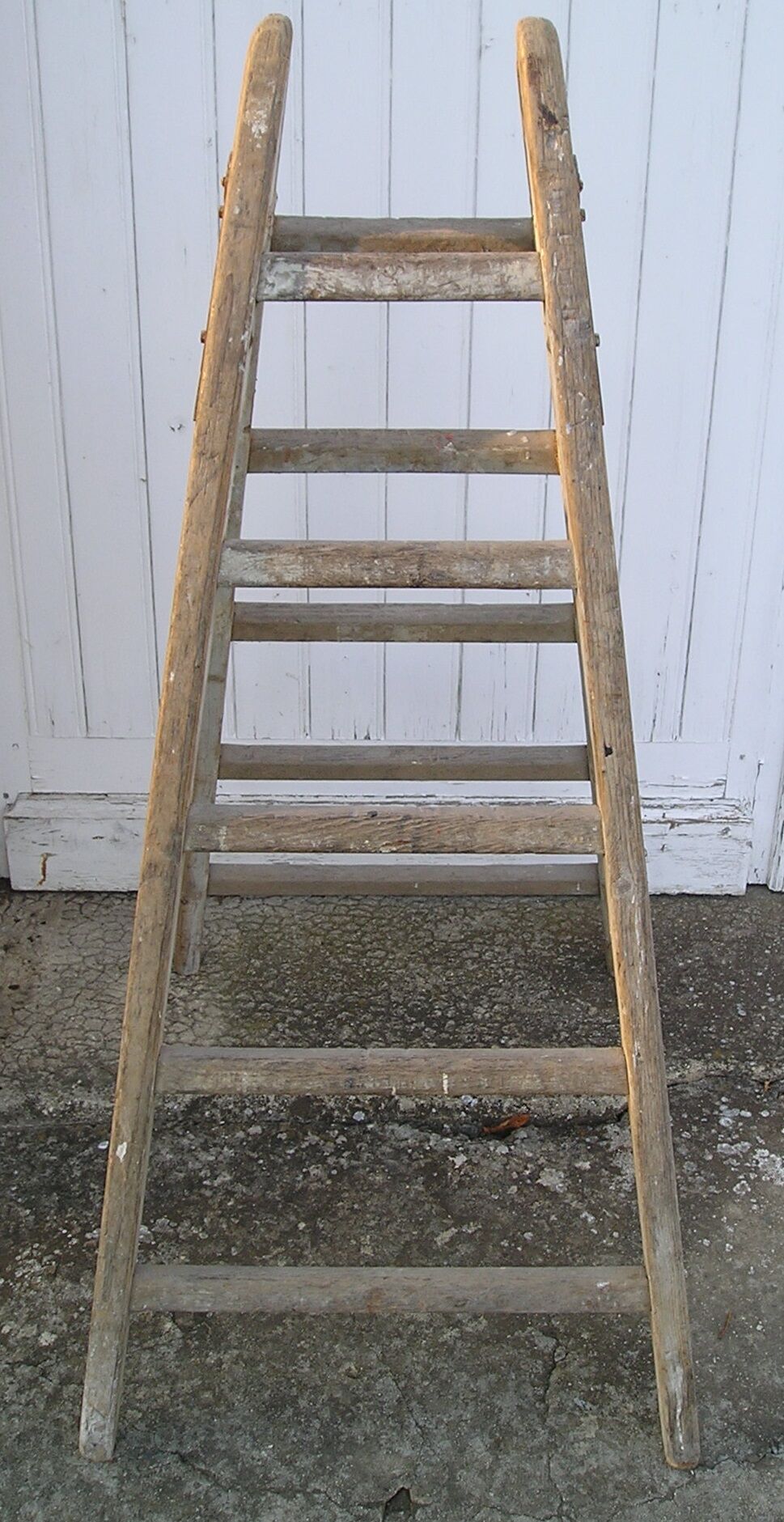 Old wooden painter ladder