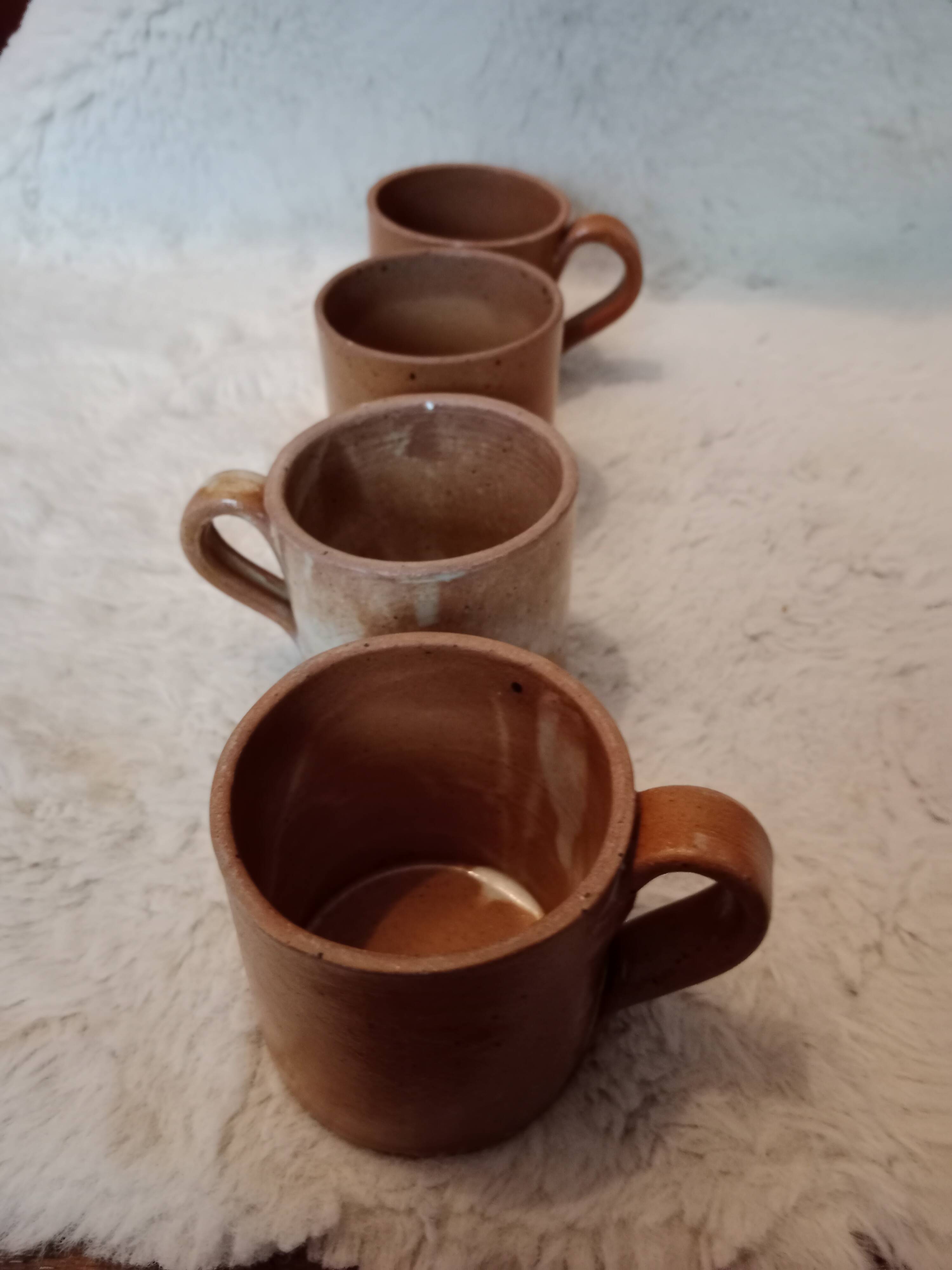 Vintage mismatched stoneware mugs