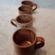 Vintage mismatched stoneware mugs