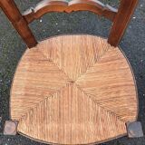 Chaise basse paillee dite chauffeuse