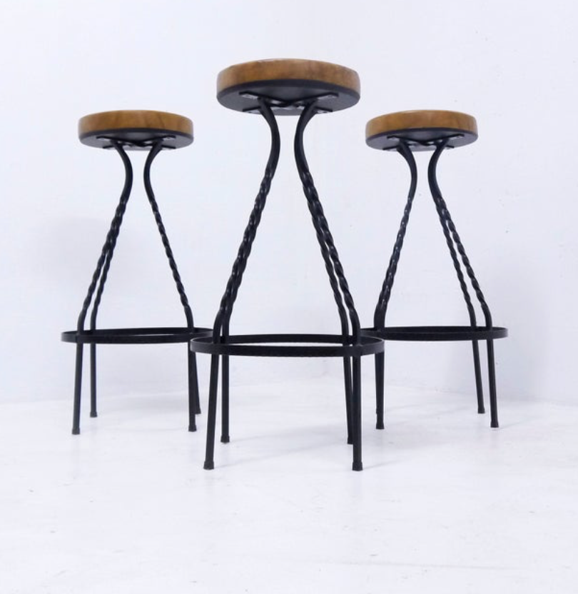 Footswith e.g. wrought iron feet and 60s vinyl seating