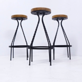 Footswith e.g. wrought iron feet and 60s vinyl seating