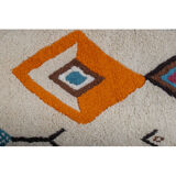 Berber carpet with knotted stitches in natural wool