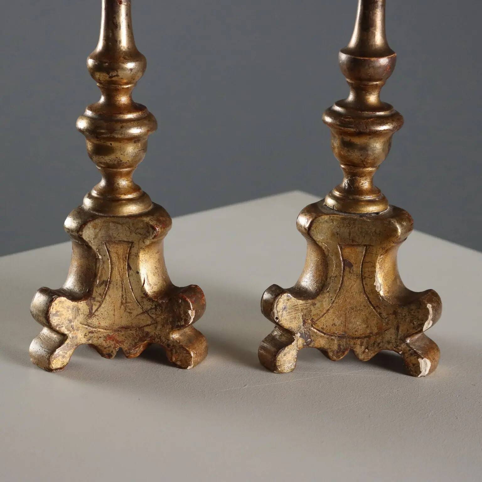 Pair of antique carved wooden candlesticks, Italy, 19th century