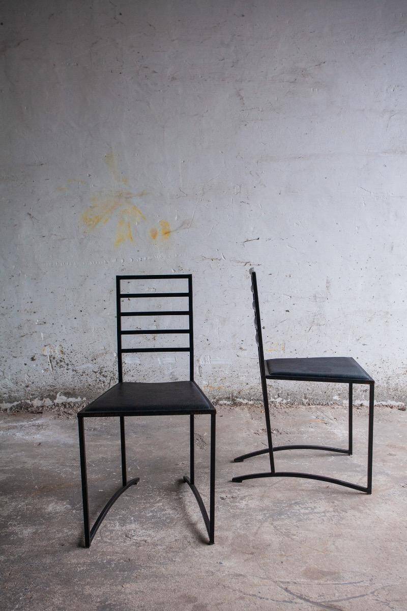 Set of 4 Black Steel Dining Chairs with Black Faux-Leather Seats — Minimalist Geometric Design