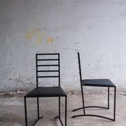 Set of 4 Black Steel Dining Chairs with Black Faux-Leather Seats — Minimalist Geometric Design