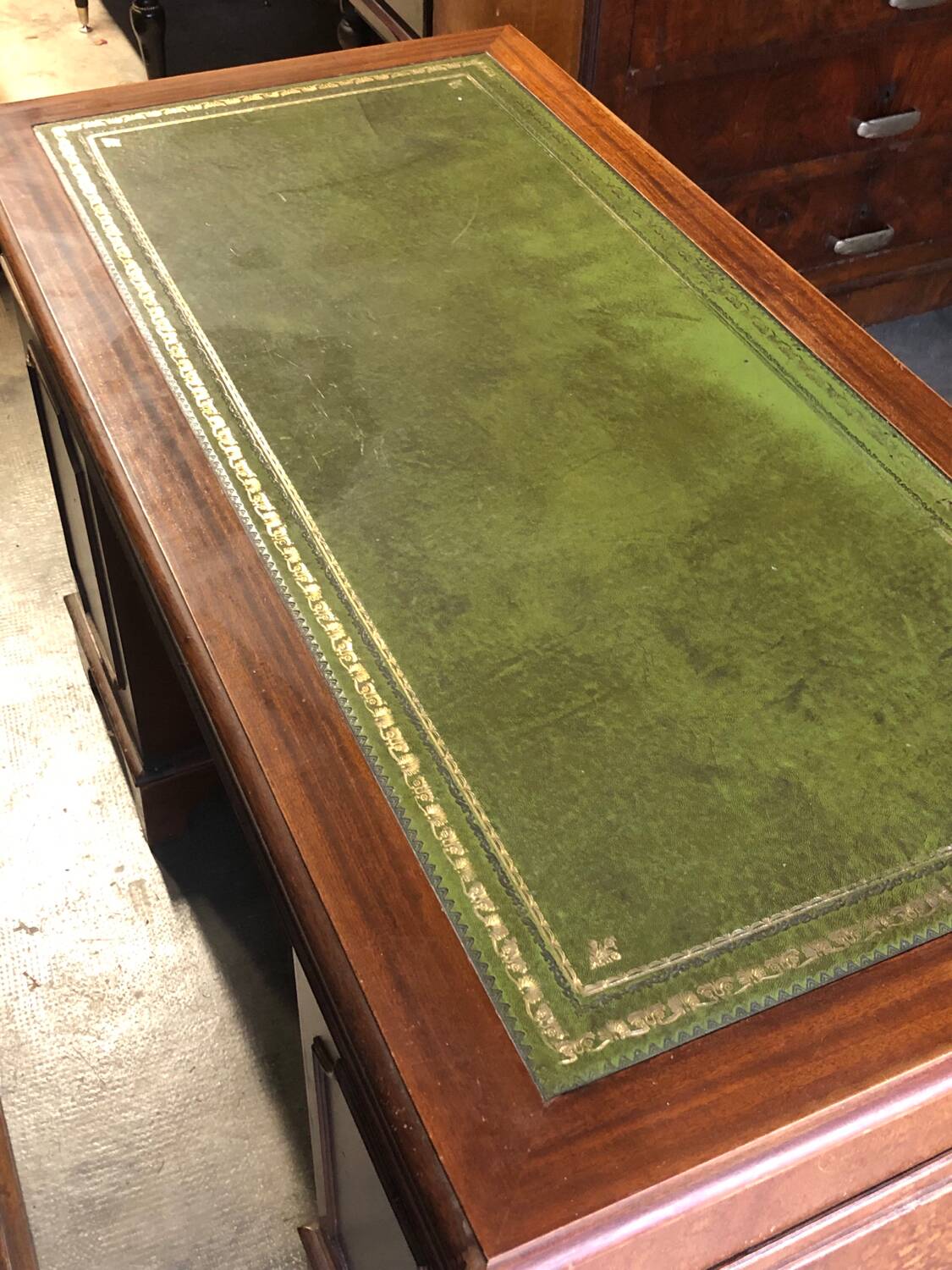 English pedestal desk with green leather top