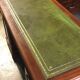 English pedestal desk with green leather top