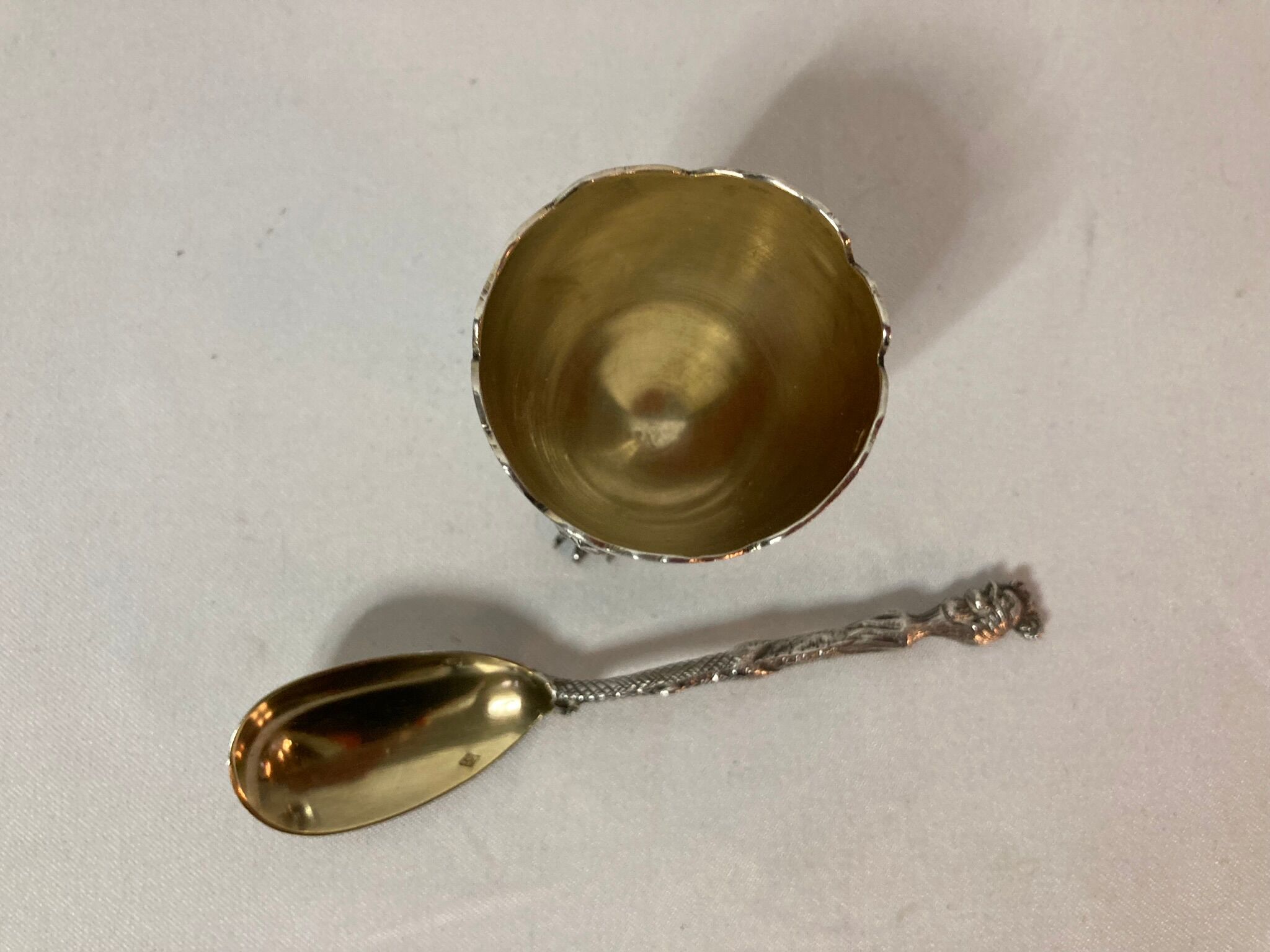 Eggcup feet and silver spoon punches early twentieth century