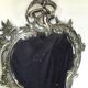 Nineteenth century mirror in silver bronze