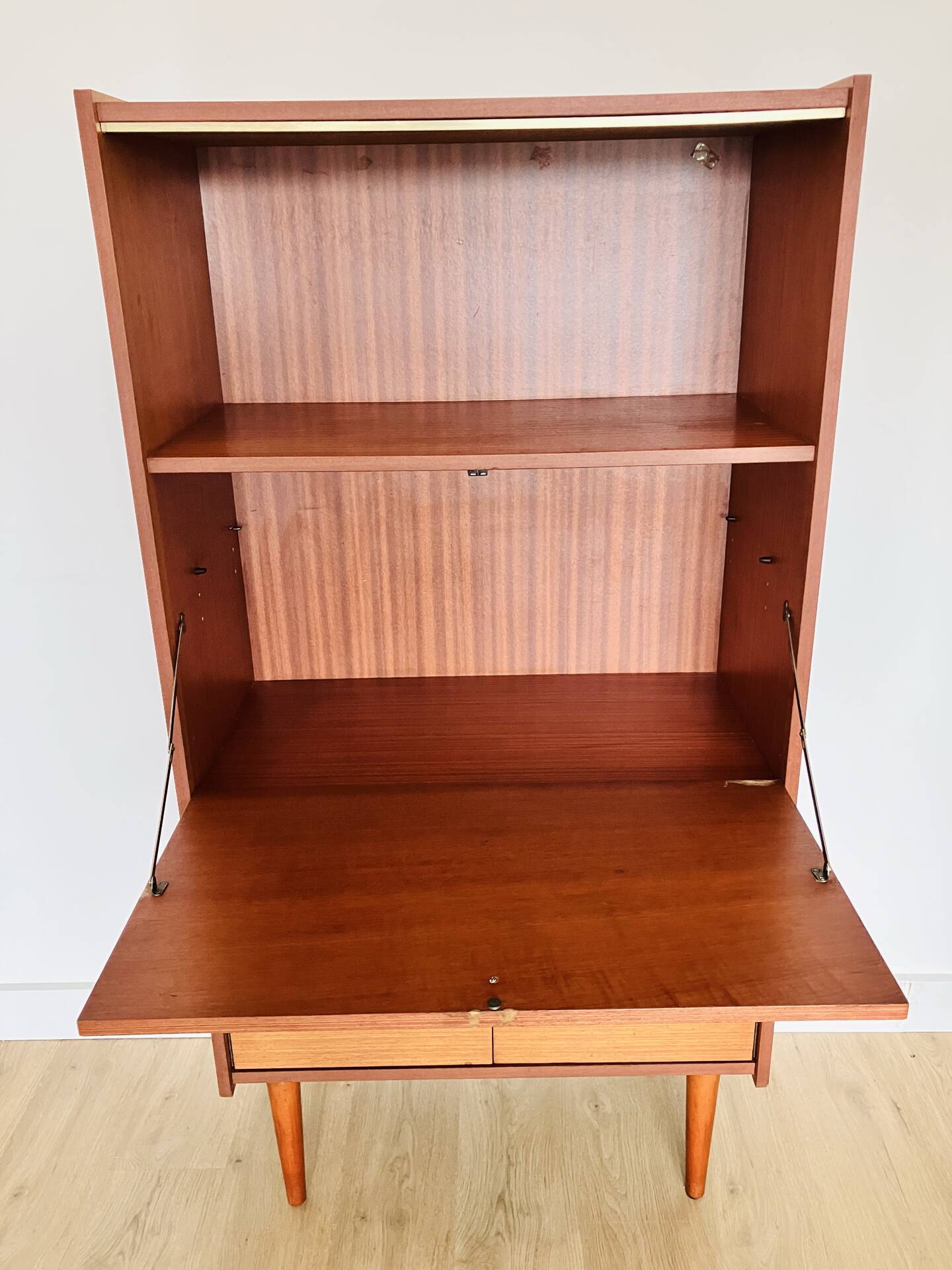Wood veneer secretary from the 1970s.