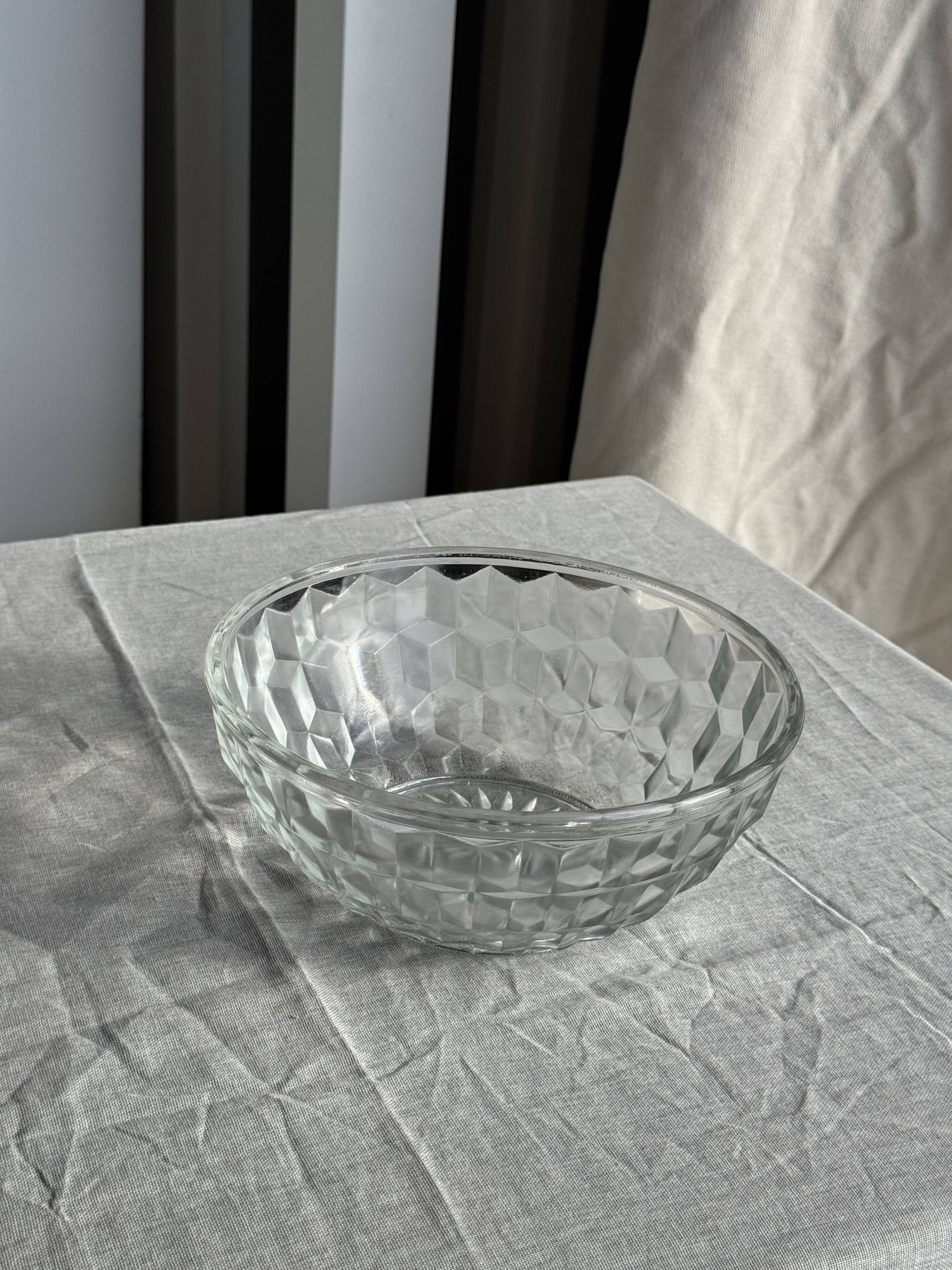 Small vintage glass bowl with a cube pattern.