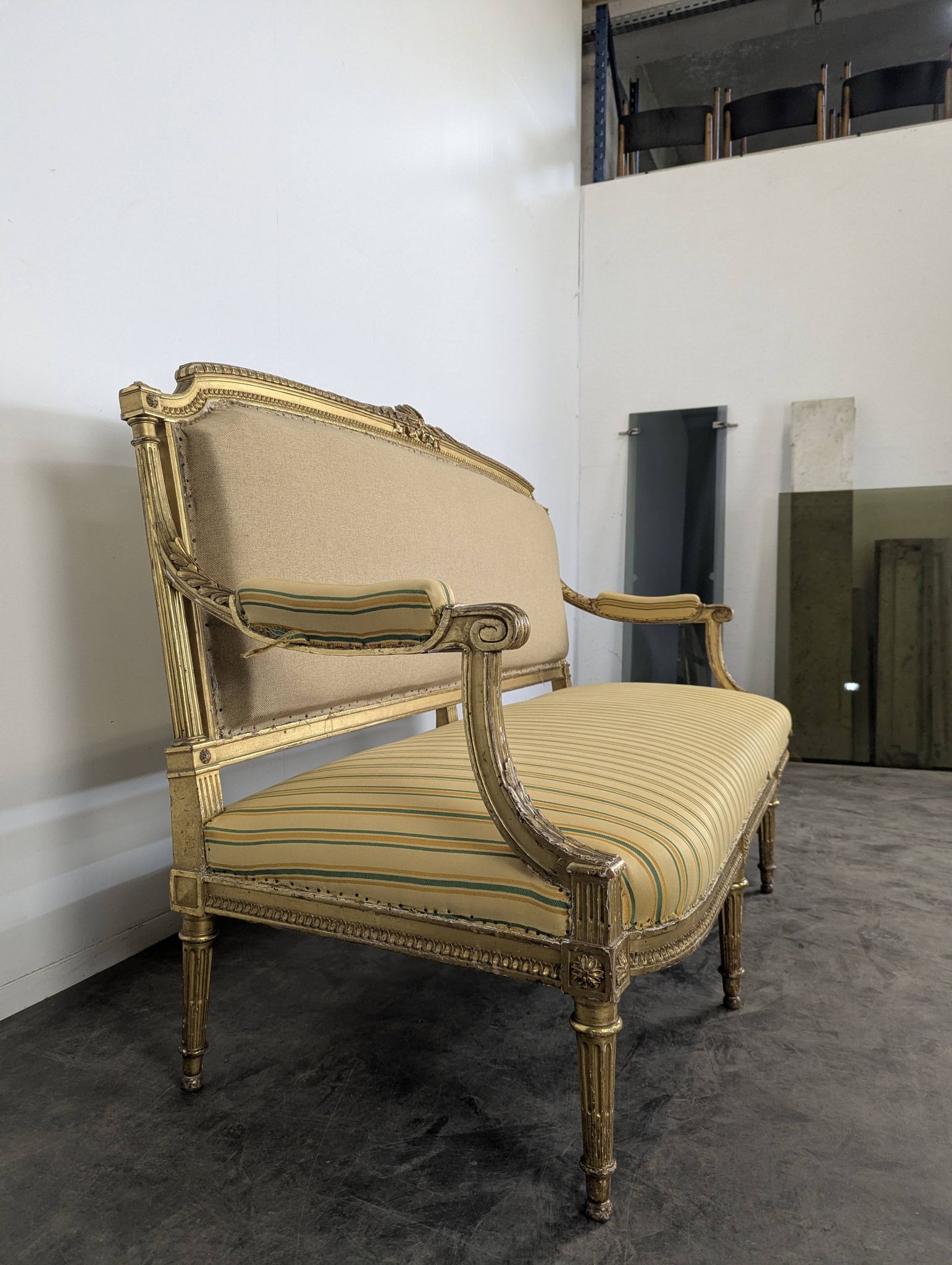 Louis XVI style canapé from the Napoleonic III era in gilded wood.