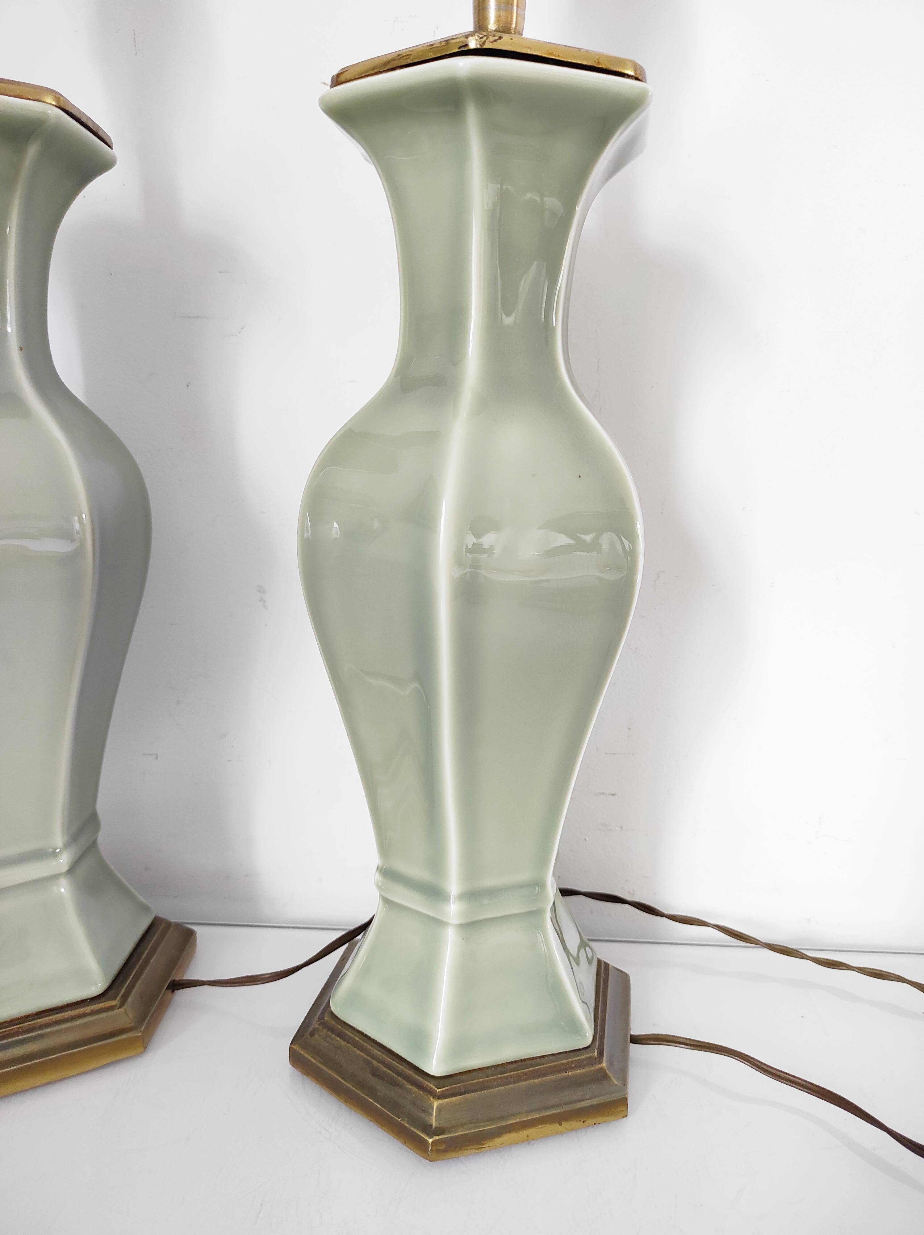 Two celadon-colored ceramic lamp bases