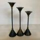 Vintage trio of blue and gold metal candle holders