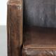 Sleekly shaped timeless design armchair made of sheepskin leather