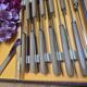 12 vintage knives in a box + 1 butter knife
