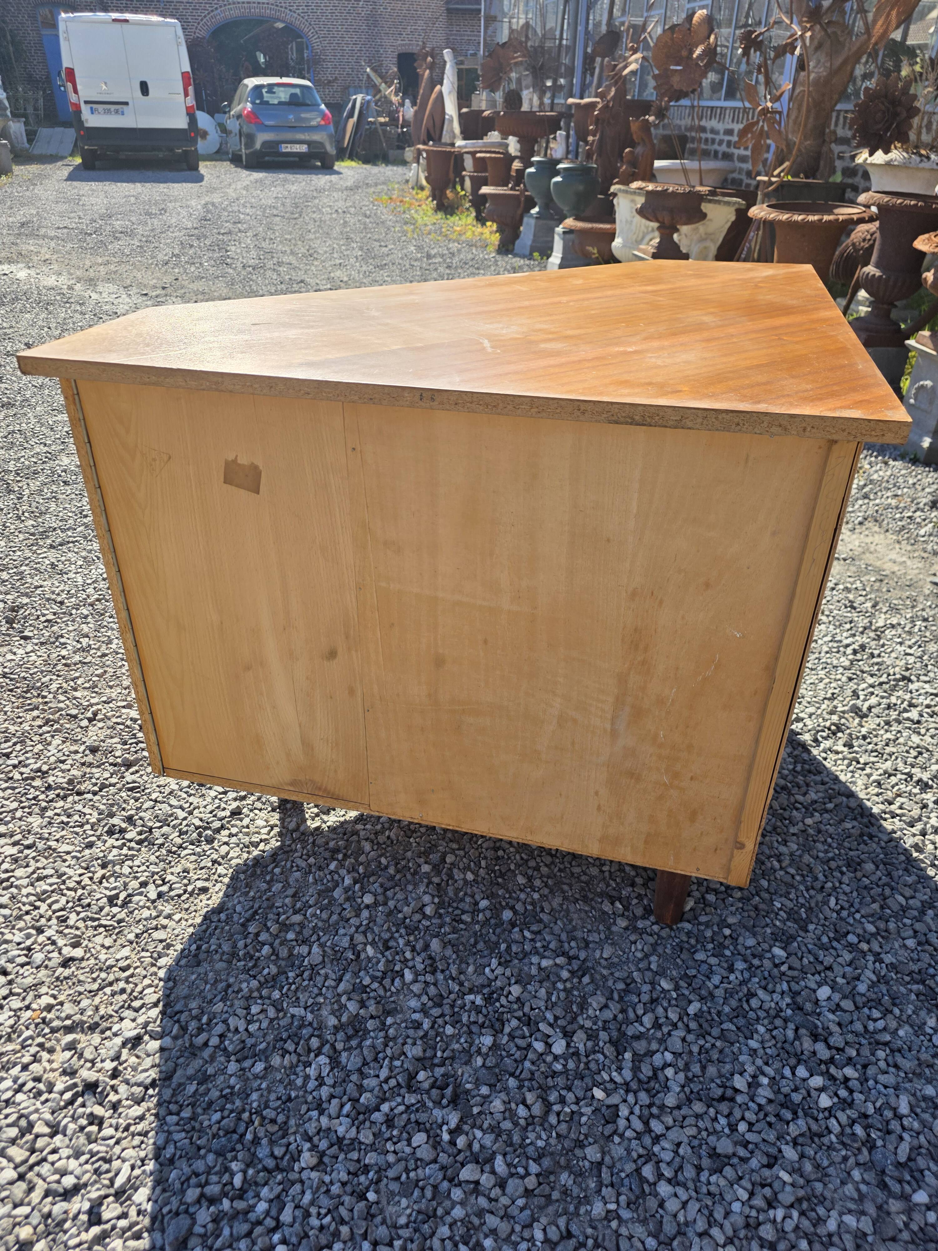 Scandinavian corner unit in teak from the 1960s.