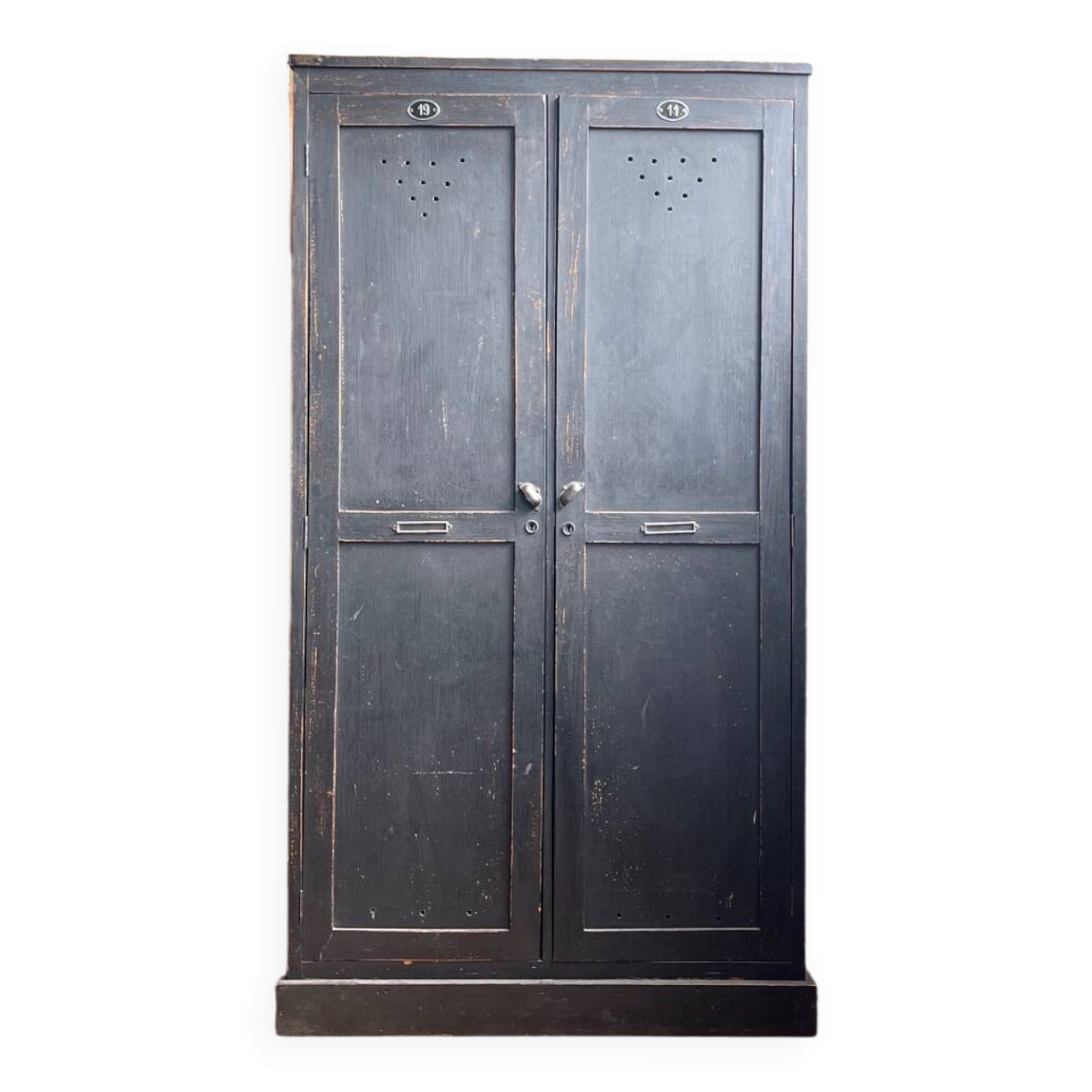 Old wooden locker with black patina
