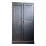 Old wooden locker with black patina