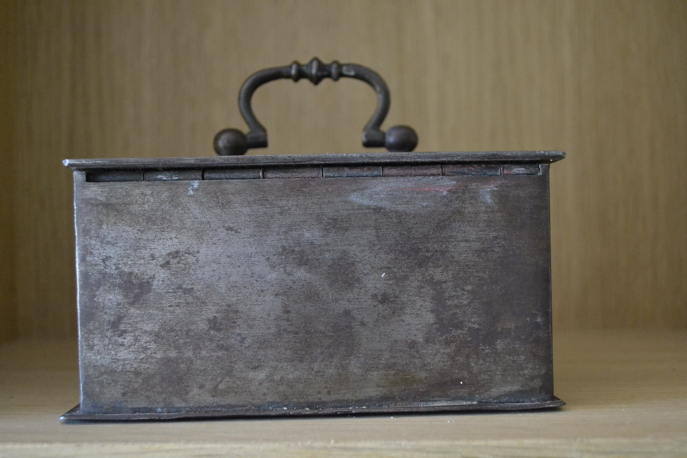 Cashier, patinated safe with its key