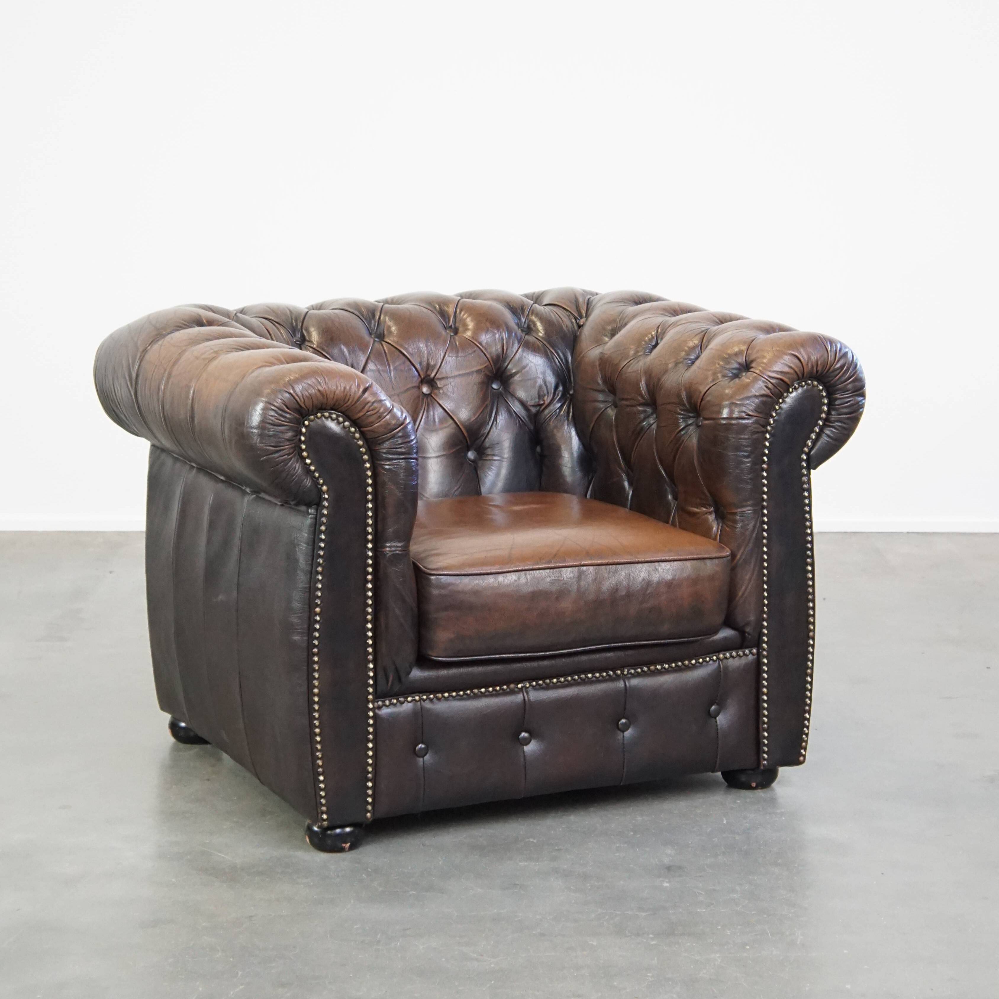 English Chesterfield armchair in sheepskin