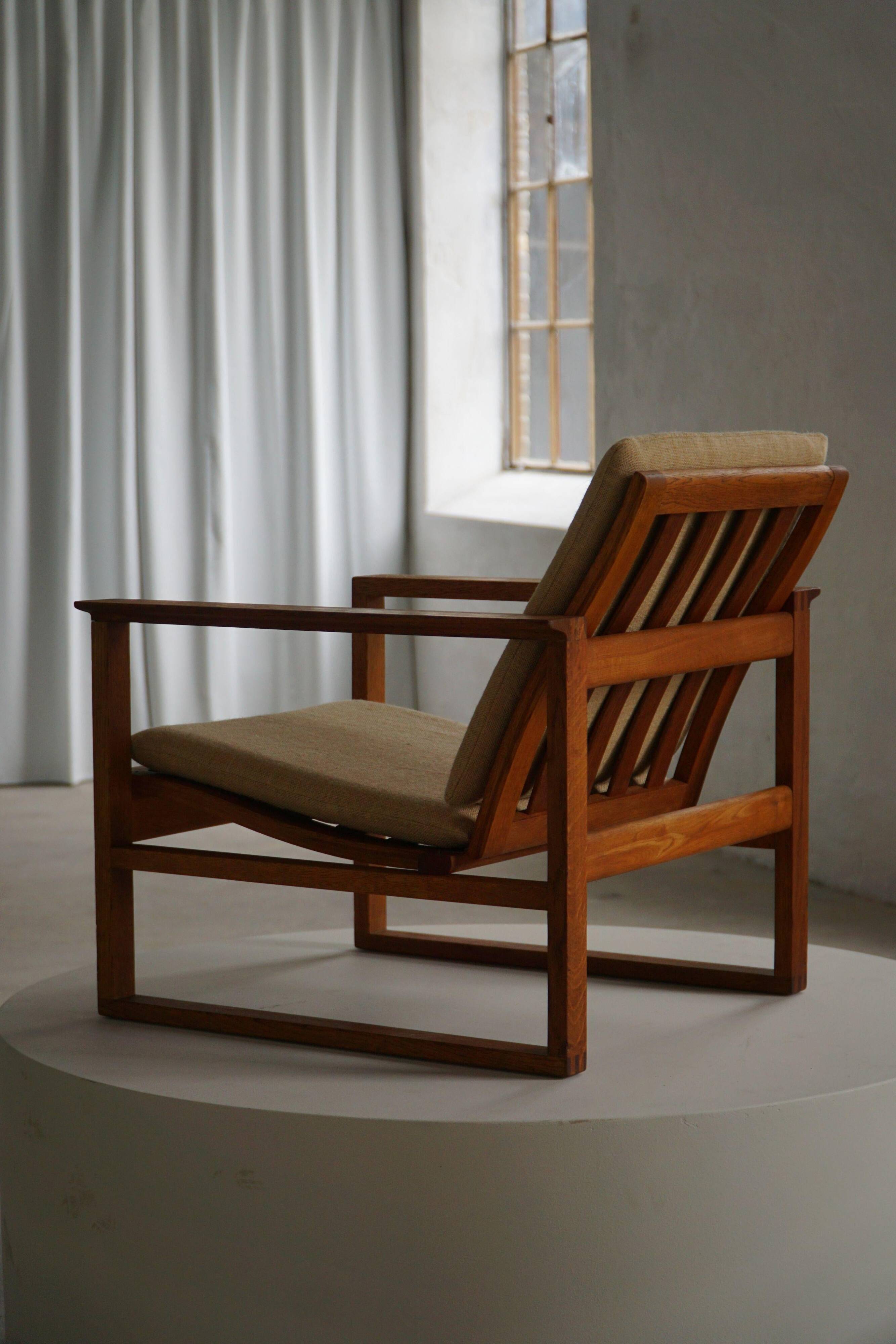 Børge Mogensen, a pair of BM2256 lounge chairs in oak and jute, Denmark, 1960s.