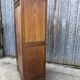 Parisian Bonnetiere armoire from the 1900s in solid chestnut.