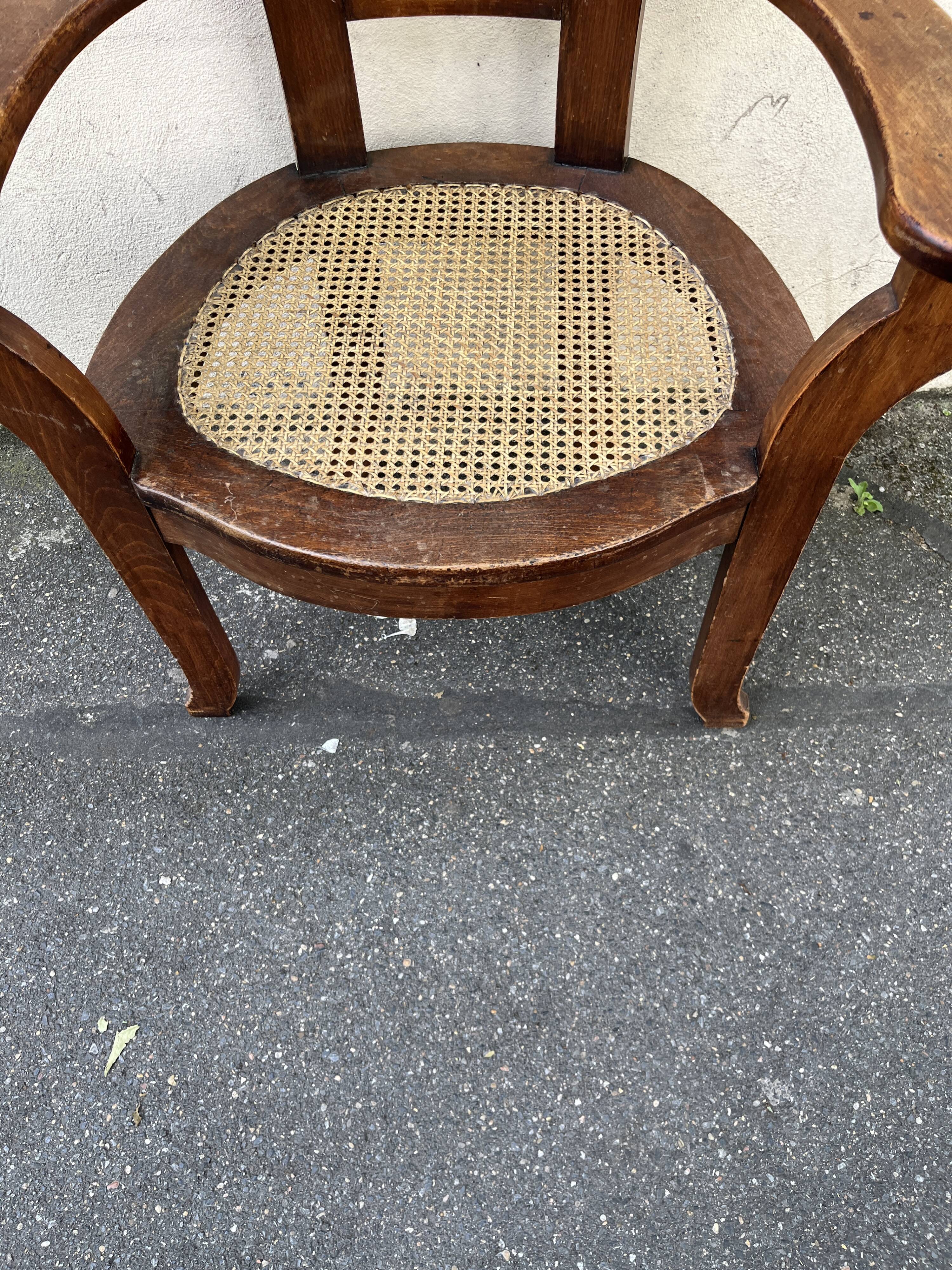 Large caned armchair