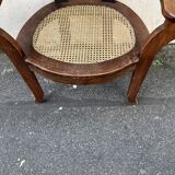 Large caned armchair