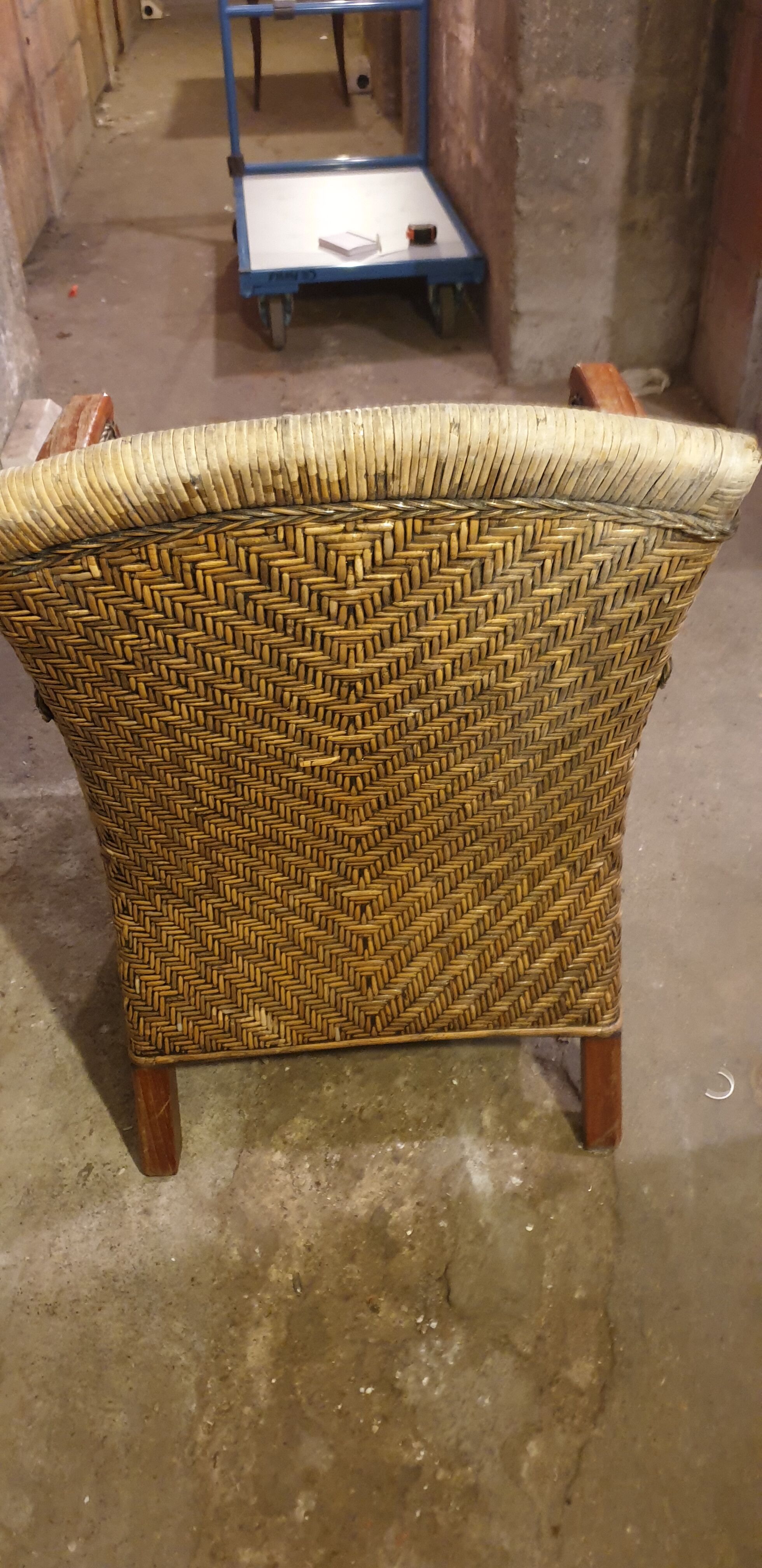 Rattan and wood armchair