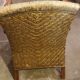 Rattan and wood armchair