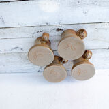 4 sandstone cups signed Jean Pierre Prudhomme