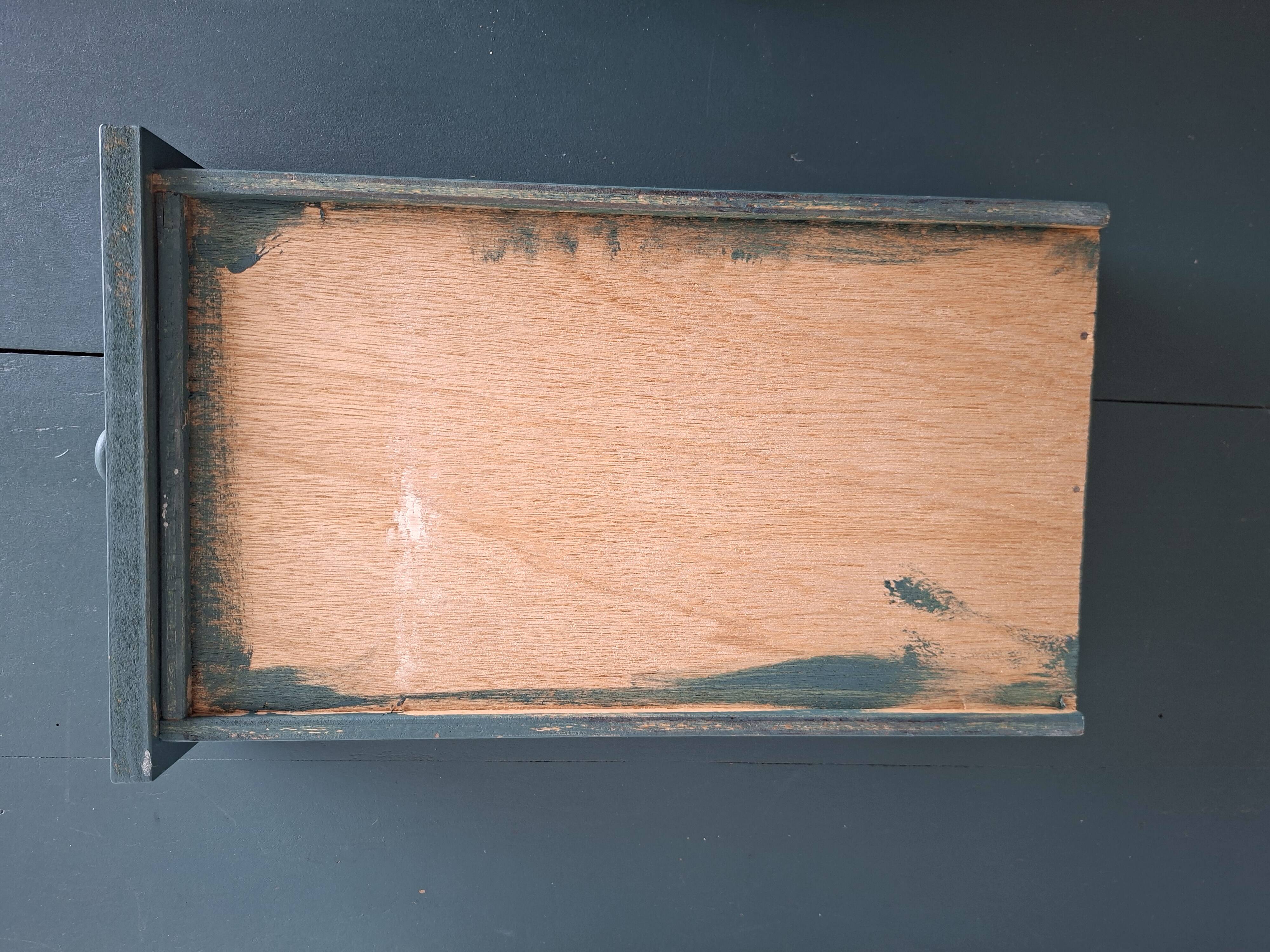 Antique Gustavian-style table painted in dark green with a drawer.