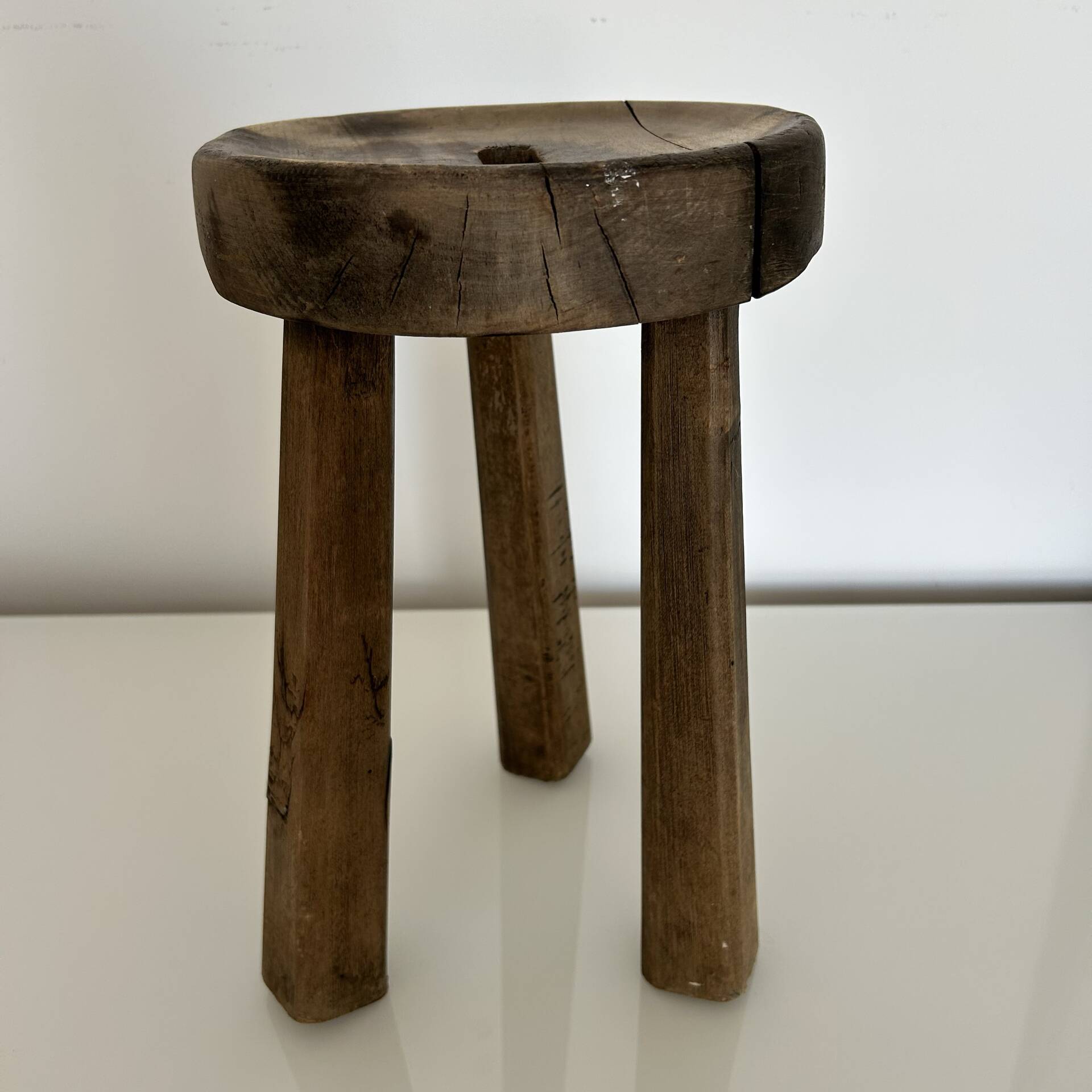 Patinated tripod stool