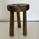Patinated tripod stool