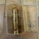Brass wall lamp and smoked glass