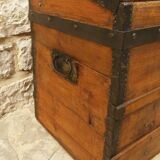 Ancient travel trunk, bulging wooden chest
