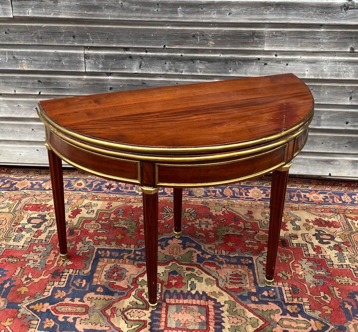 Half moon table in mahogany era Louis XVI XVIII th century