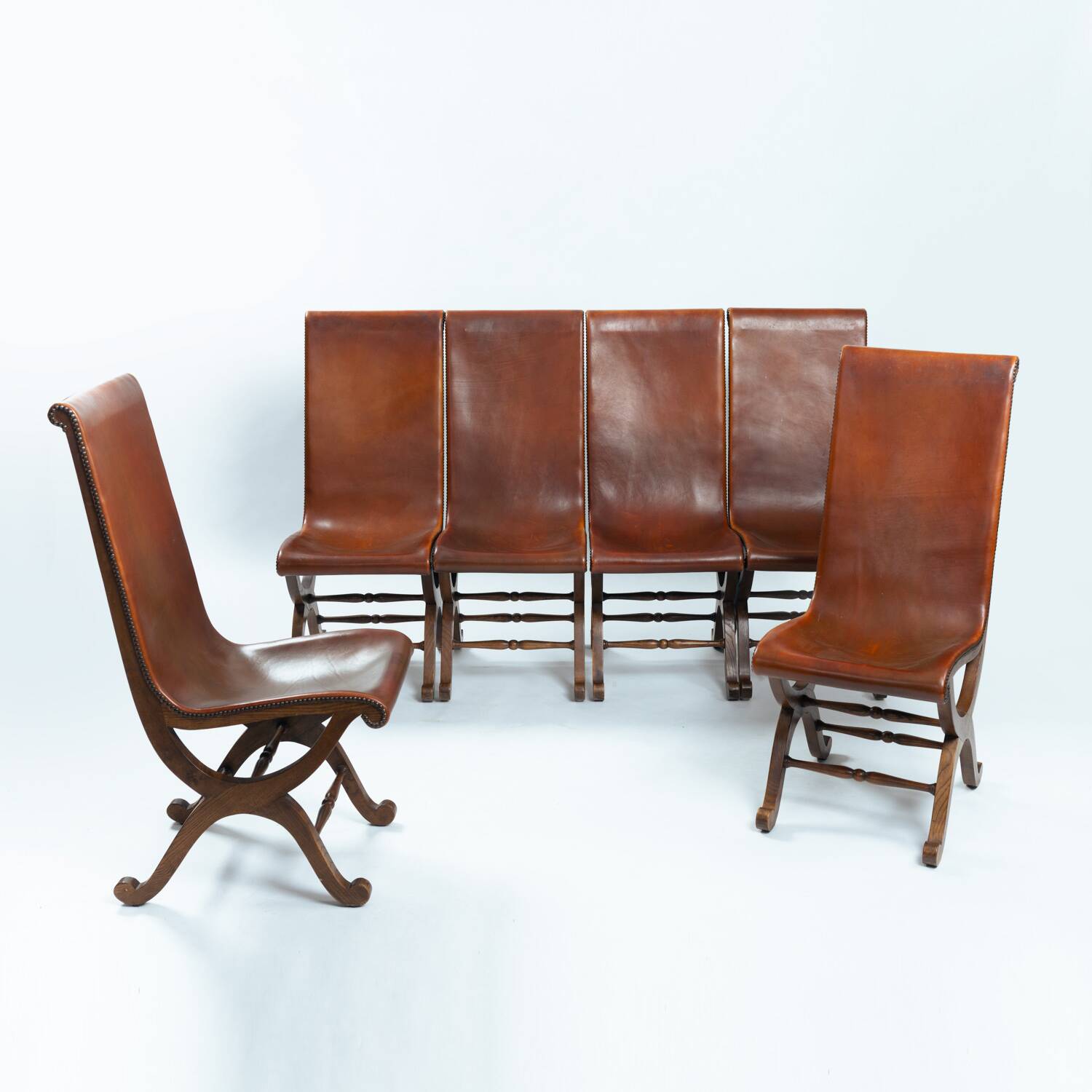 Pierre Lottier brown Spanish leather Slipper chairs by Almazan, 1950s