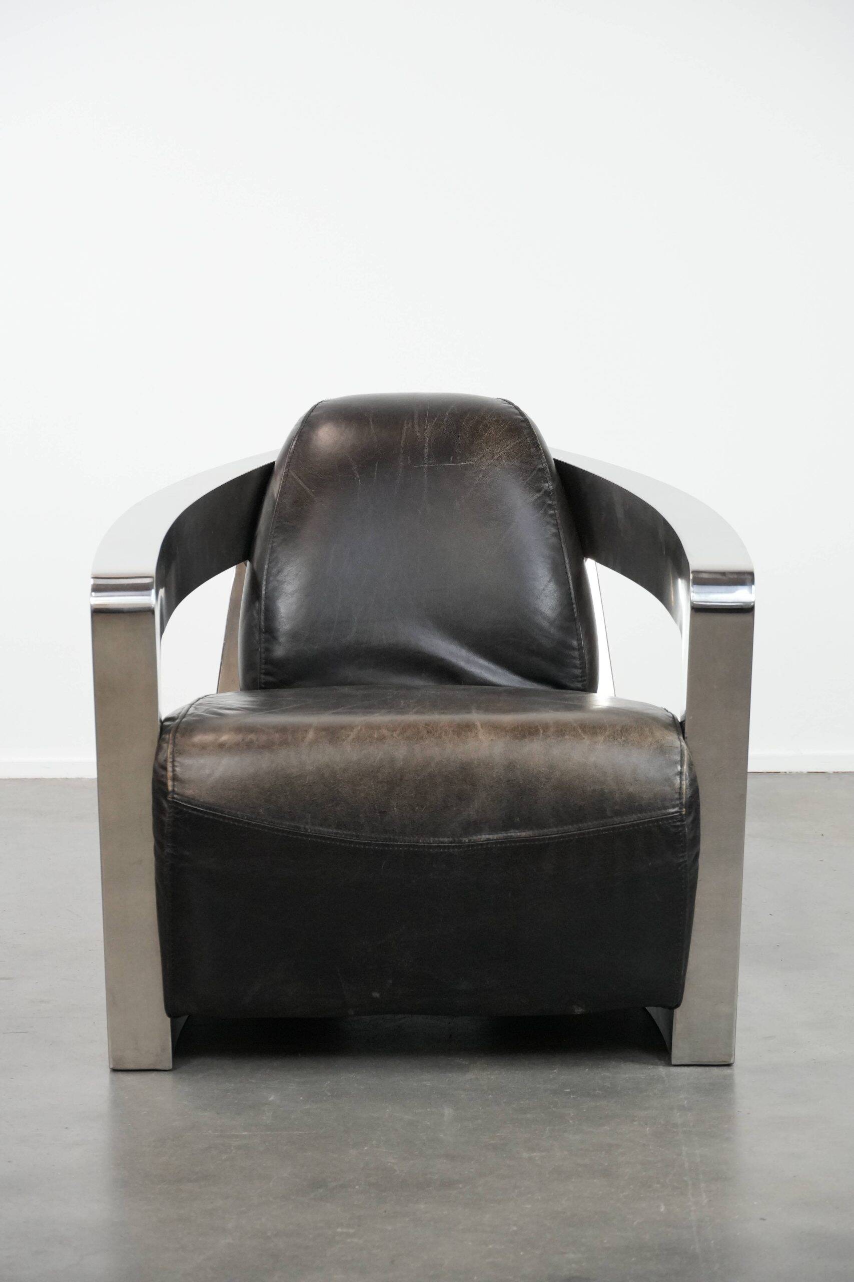 Unique design Aviator armchair with an aluminium frame