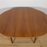 Table à manger ronde extensible en palissandre du milieu du siècle de McIntosh, Royaume-Uni, années 1960
